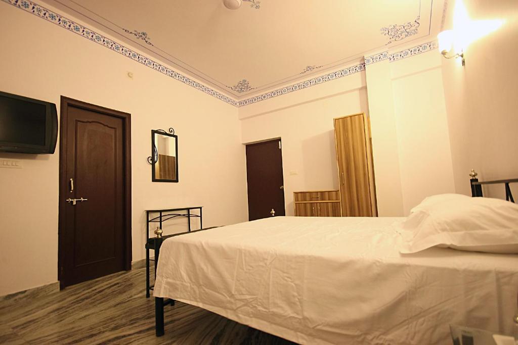 Hotel Devi Palace Udajpur Pokoj fotografie